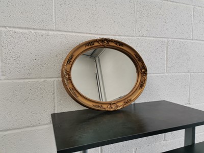 Lot 160 - Oval wall hanging mirror. Width 48cm, height...