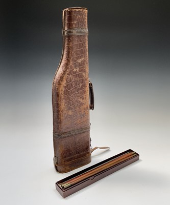 Lot 81 - A leather leg of mutton gun case, with...