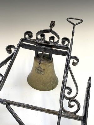 Lot 399 - A black painted wrought iron and brass wall...