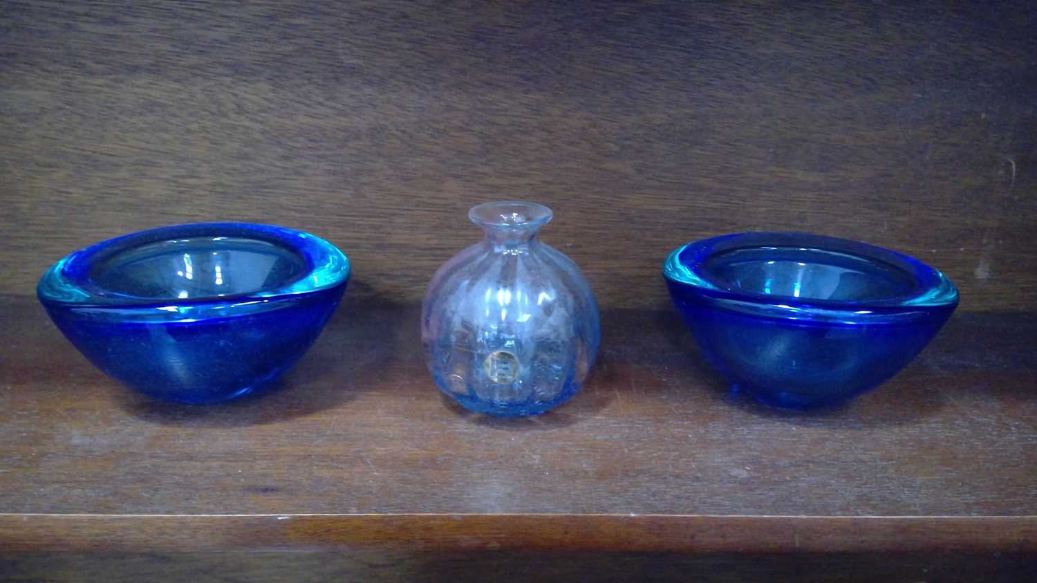 Lot 172 - Peter Tysoe glass bottle vase and two blue...