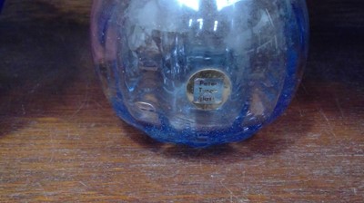 Lot 172 - Peter Tysoe glass bottle vase and two blue...