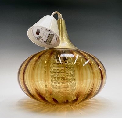 Lot 63 - A 1970s amber glass pendant light fitting,...