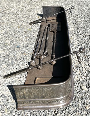 Lot 7 - A Georgian steel fender, complete with three...