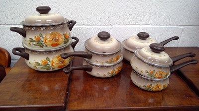 Lot 207 - A set of Stahlenmail enamel saucepans and...