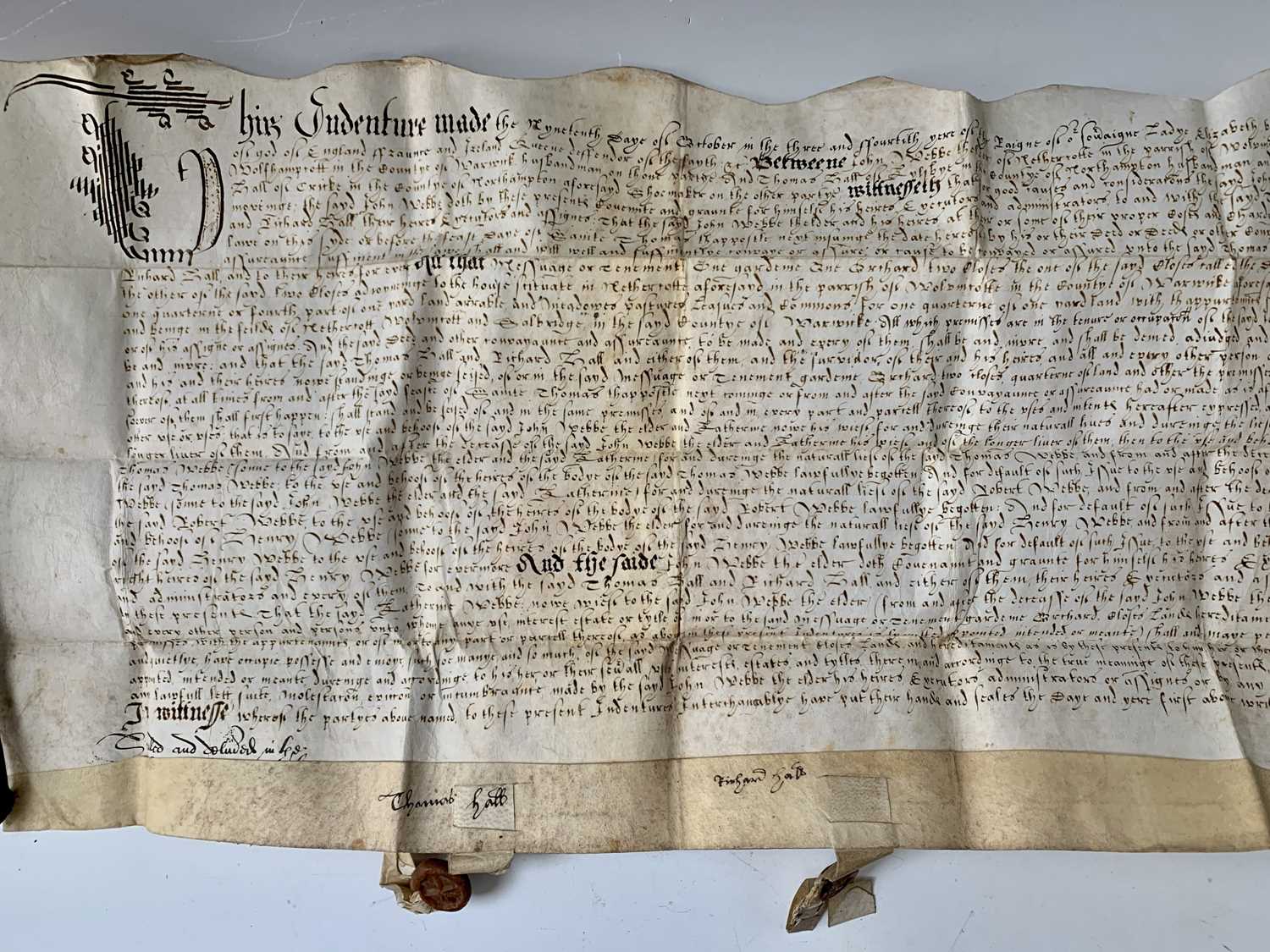 Lot 1216 - 1: INDENTURE. Fine Elizabeth I with one and a...
