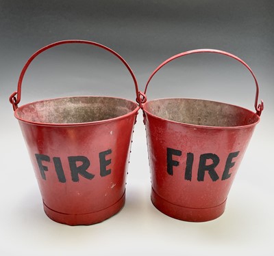Lot 41 - A pair of red painted 'FIRE' buckets. Height...