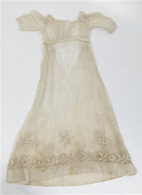 Lot 3216 - An early 19th century sheer white muslin gown...