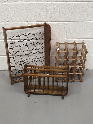 Lot 259 - Two wine racks and an oak magazine tidy.