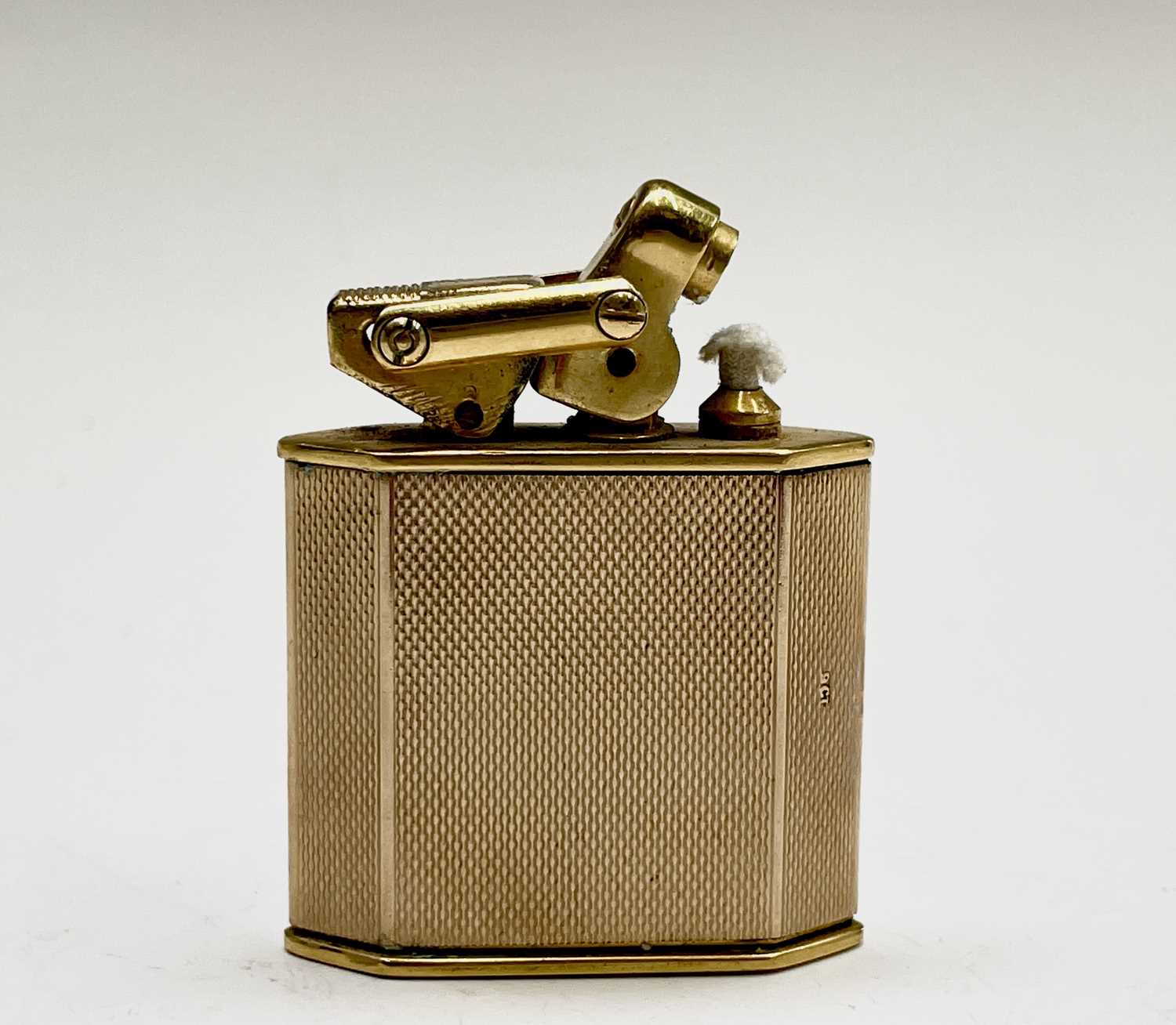 Lot 44 - A 9ct gold Karl Weiden cigarette lighter,...