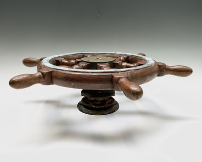 Lot 126 - A teak and brass small ship's wheel, with five...