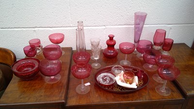 Lot 239 - A set of cranberry glassware.