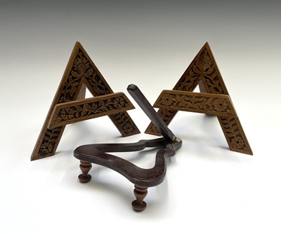 Lot 83 - A pair of 20th century carved wood table...