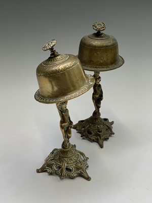 Lot 26 - A pair of early 20th century brass counter...