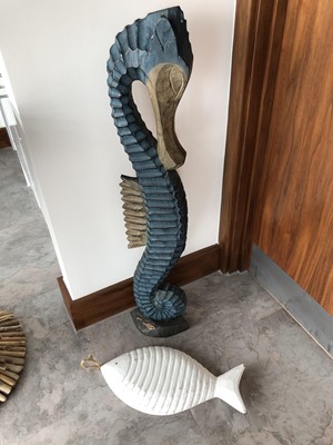 Lot 289 - Carved wood seahorse height 100cm and a carved...