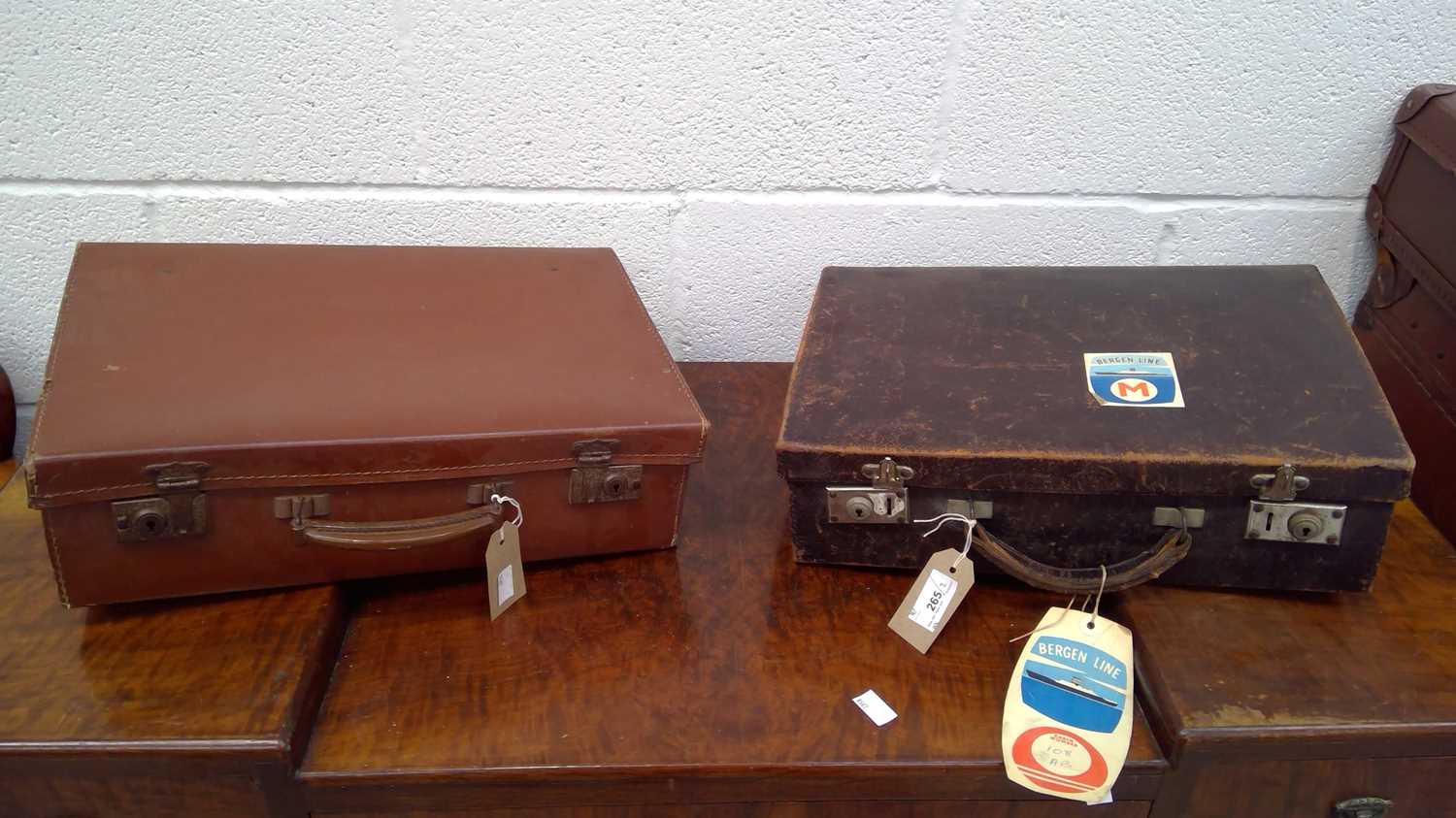 Lot 265 - A vintage leather travel case with a vintage...