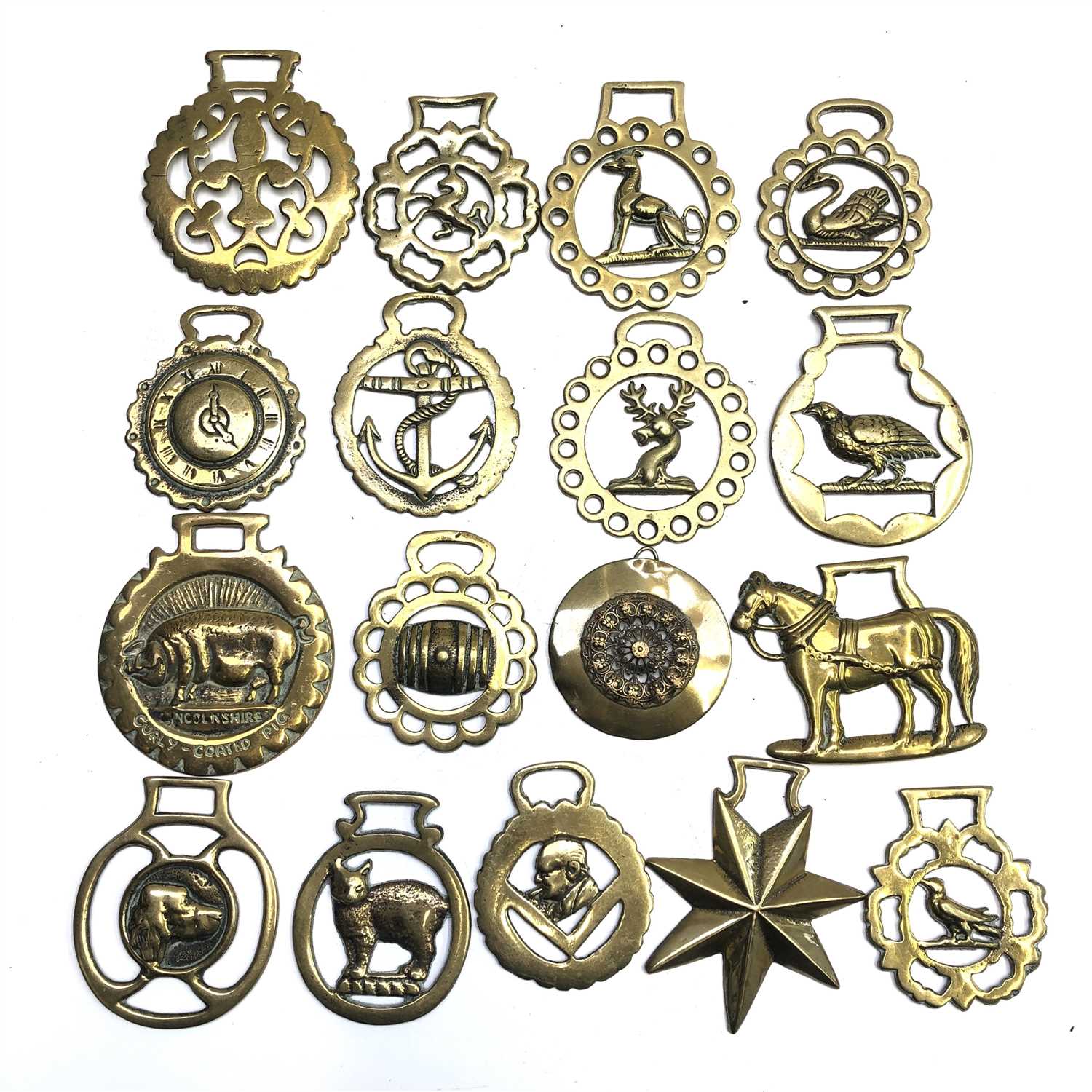 Lot 47 - A collection of 17 horse brasses.