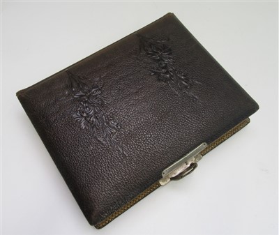 Lot 91 - An early 20th century photograph album and...
