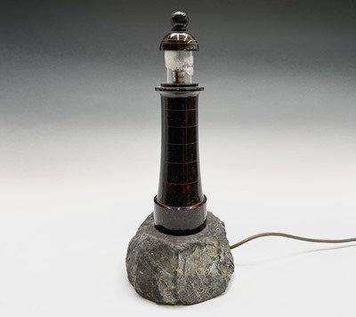Lot 17 - A Cornish serpentine table lamp, modelled as a...