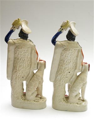 Lot 976 - Two Victorian Staffordshire flatback figures,...