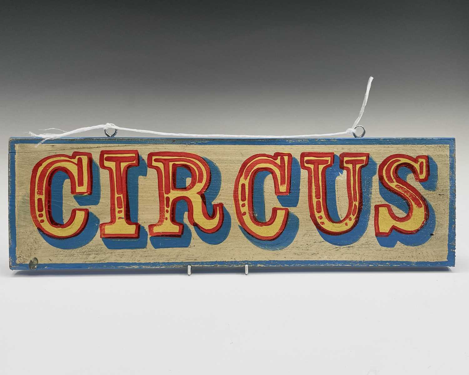 Lot 120 - A signwritten wooden sign 'CIRCUS', having...