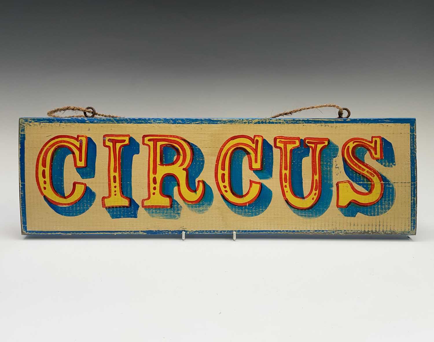 Lot 119 - A signwritten wooden sign 'CIRCUS', having...