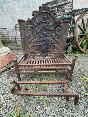 Lot 397 - A cast iron fire back, probably circa 1900,...