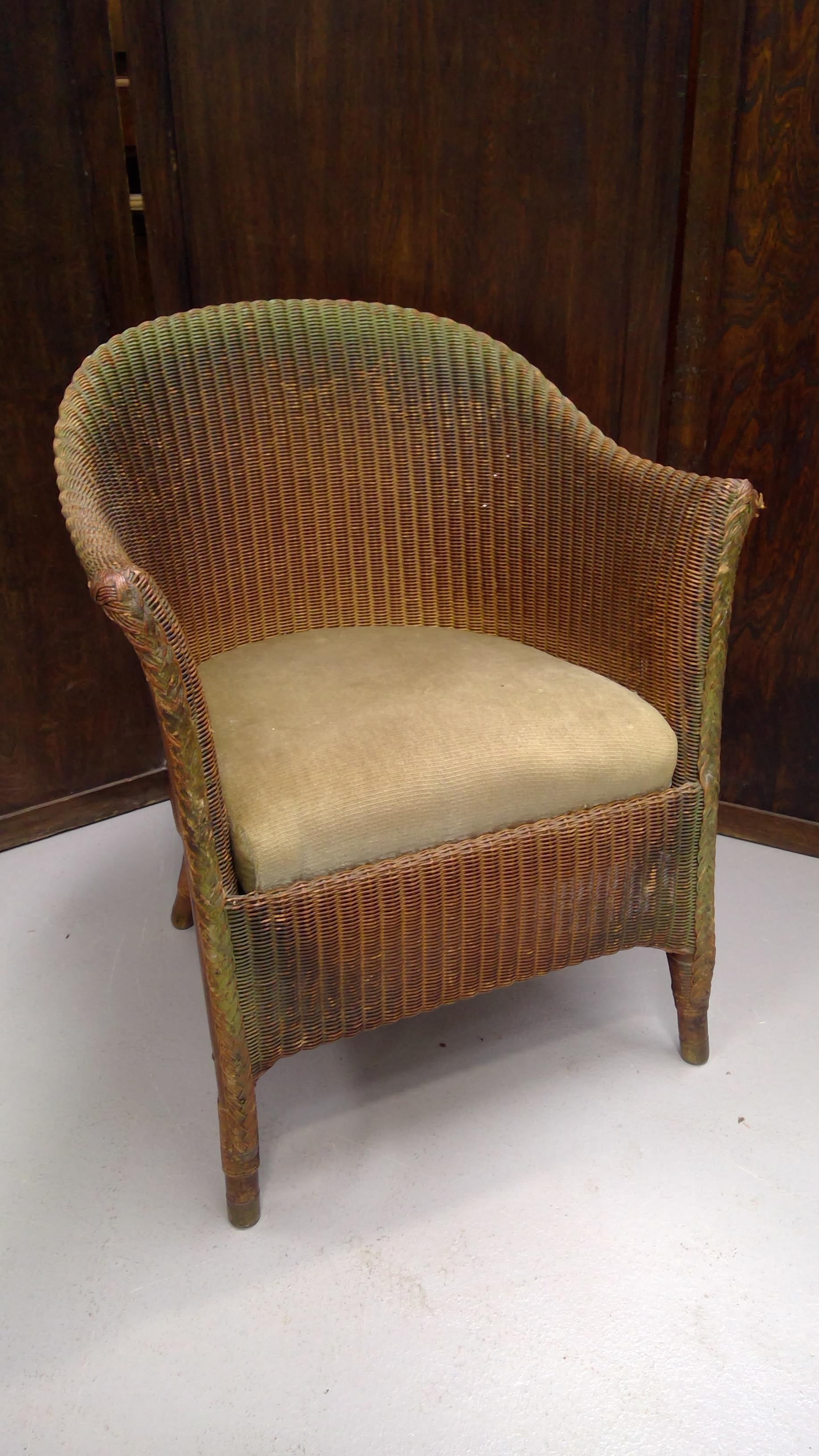 Lot 24 A Lloyd Loom chair.