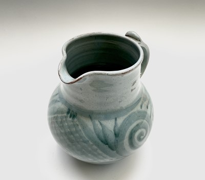 Lot 881 - A Lamorna pottery jug, the blue ground...