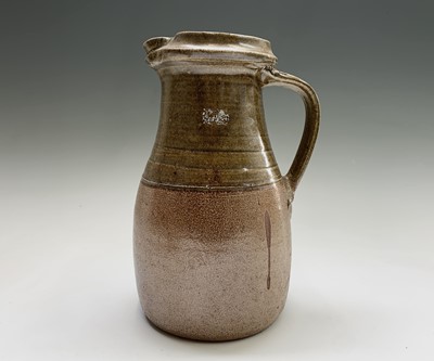 Lot 882 - A salt glazed stoneware jug, height 27.5cm,...