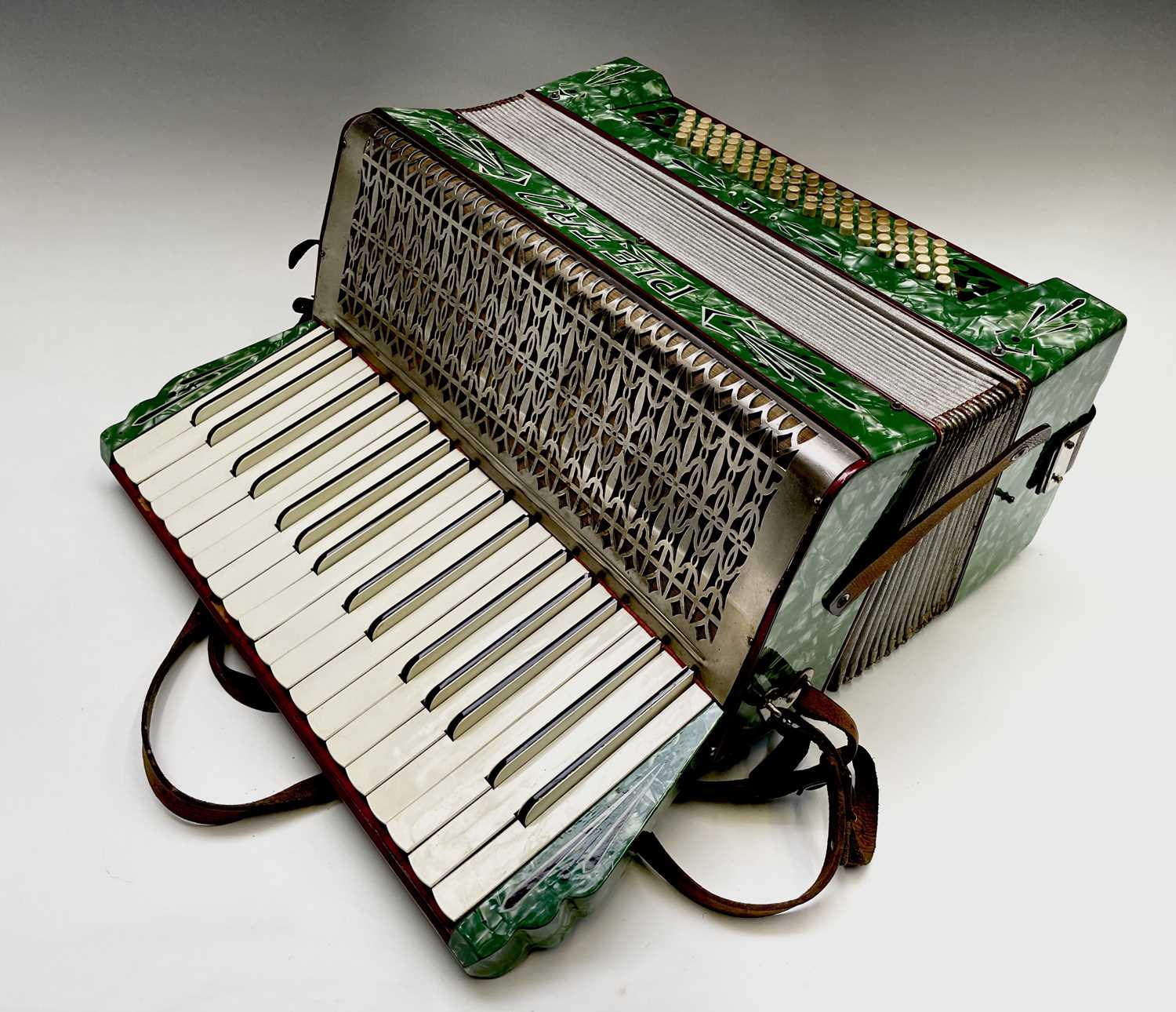 Lot 386 - A German Pietro accordion, cased, width 41cm.