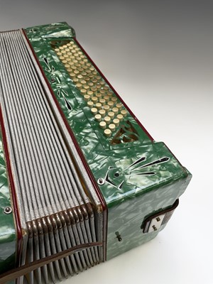 Lot 386 - A German Pietro accordion, cased, width 41cm.