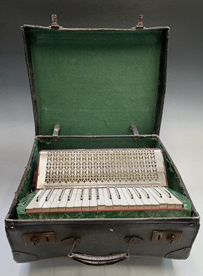 Lot 386 - A German Pietro accordion, cased, width 41cm.