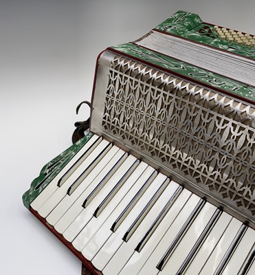 Lot 386 - A German Pietro accordion, cased, width 41cm.