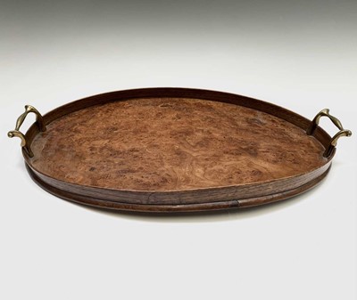 Lot 13 - A burr ash twin handled oval tray, early 20th...