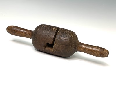 Lot 565 - A 19th century pine pit saw handle, length 37cm.