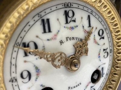 Lot 2923 - A French red marble clock, late 19th century,...