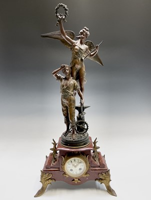 Lot 2914 - A French red marble clock, late 19th century,...