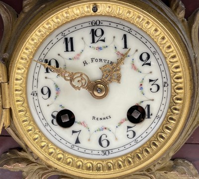 Lot 2923 - A French red marble clock, late 19th century,...