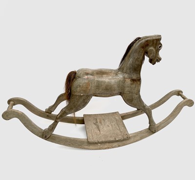 Lot 271 - A carved wood rocking horse, with horsehair...