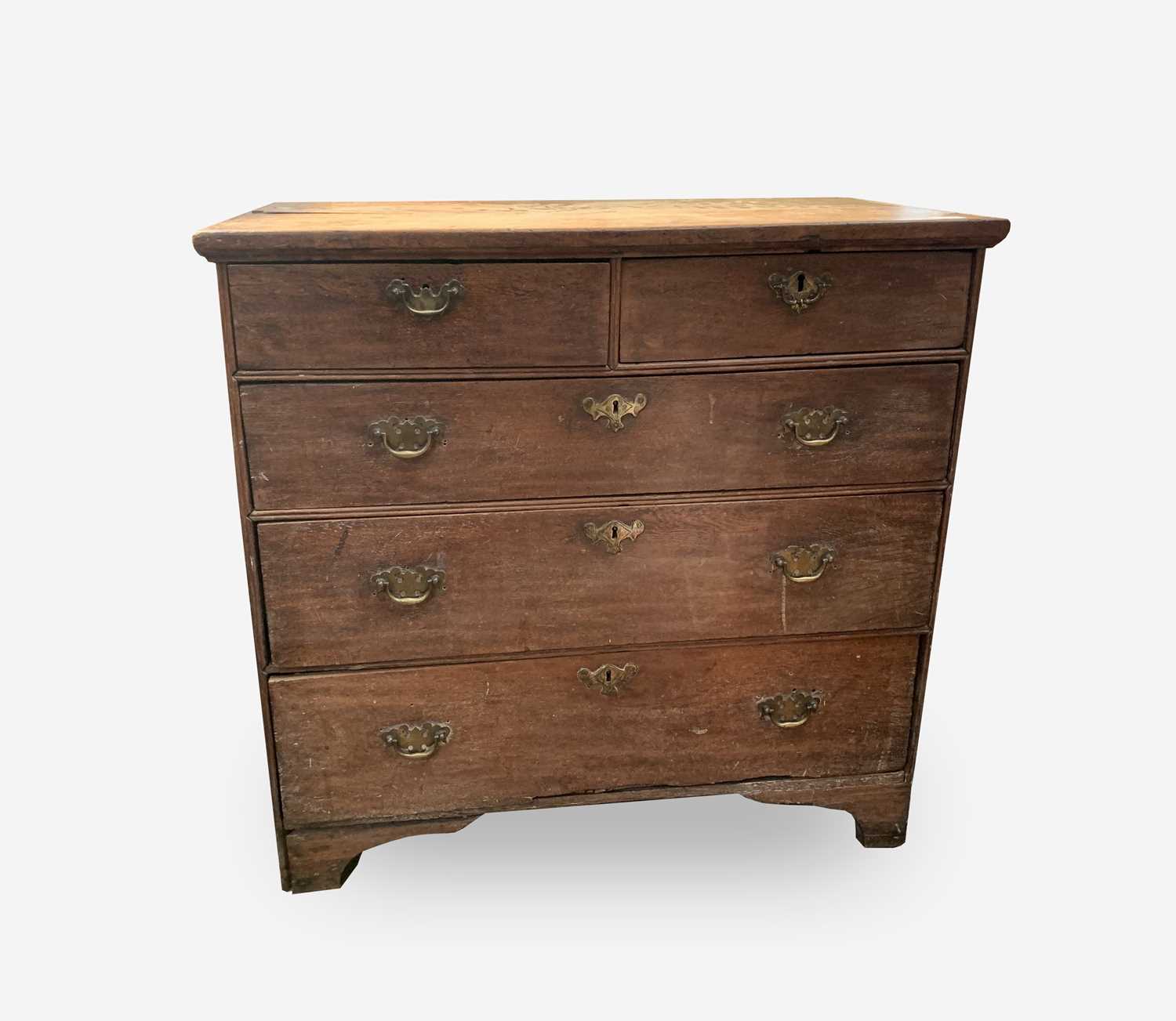 Lot 51 - A George III oak chest of drawers, with two...