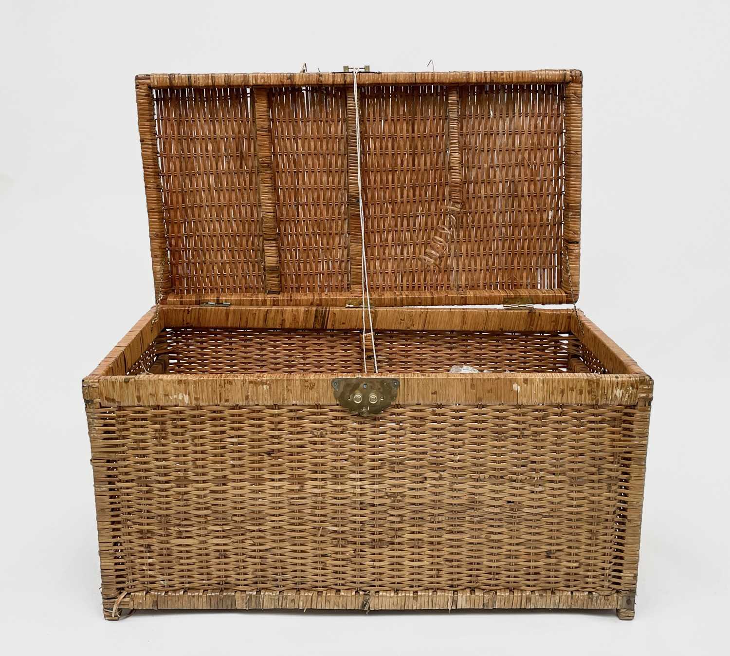 Lot 335 - A cane trunk. Width 85cm.