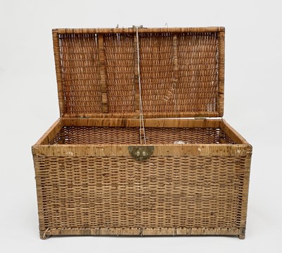 Lot 335 - A cane trunk. Width 85cm.