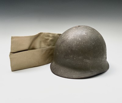 Lot 241 - A Belgian paratrooper helmet, the liner...