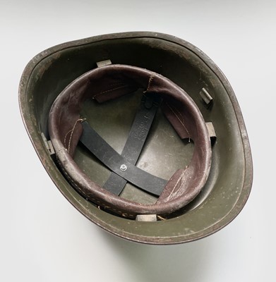 Lot 241 - A Belgian paratrooper helmet, the liner...
