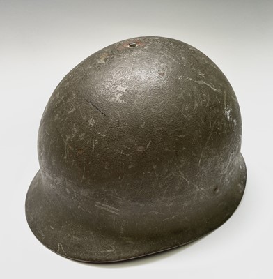 Lot 241 - A Belgian paratrooper helmet, the liner...