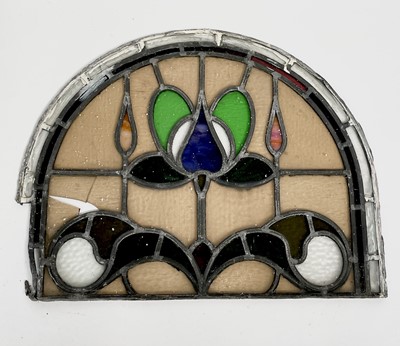 Lot 156 - An early 20th century leaded and stained glass...