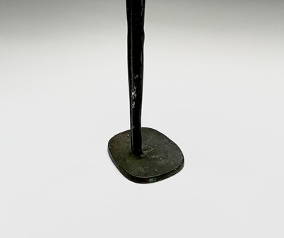 Lot 139 - An African bronze figure, of elongated form,...