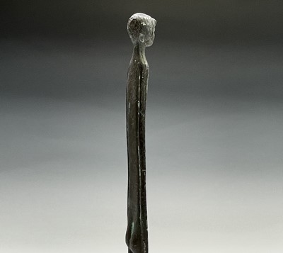Lot 139 - An African bronze figure, of elongated form,...