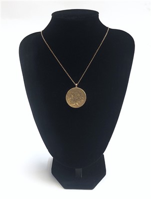 Lot 2455 - A 9ct gold, post War rose engraved locket on...