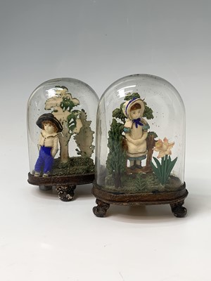 Lot 204 - A pair of unusual painted figures of a boy and...